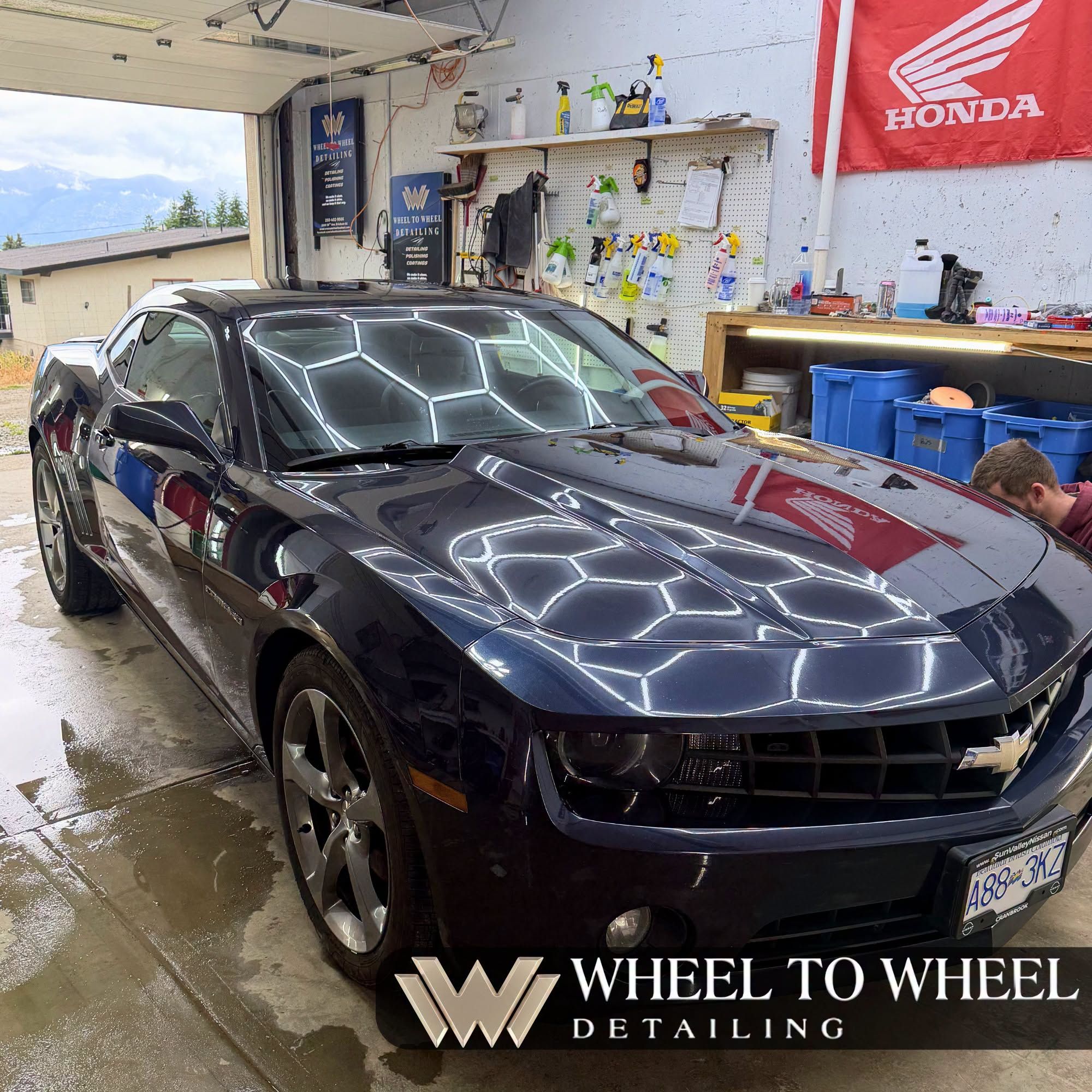 Protective coating beading water on a vehicle in Creston BC — Wheel to Wheel Detailing